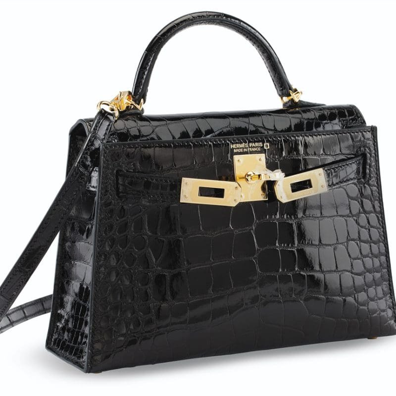 Hermès A SHINY BLACK ALLIGATOR SELLIER MINI KELLY 20 II WITH GOLD HARDWARE